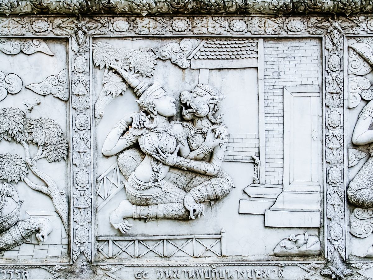Traditional stucco style of old Thai masterpiece art on Ramayana story, decorative temple wall in Wat Panan Choeng temple, Ayutthaya, Thailand. 